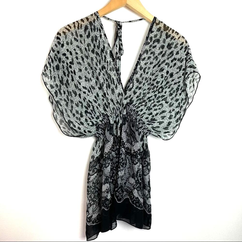 Max Rave | Sheer Flowing Blouse V Neck Black Animal Print